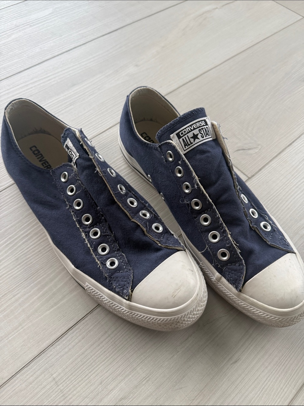 Converse All Star Low-Top Slip-On Sneakers in Navy and White